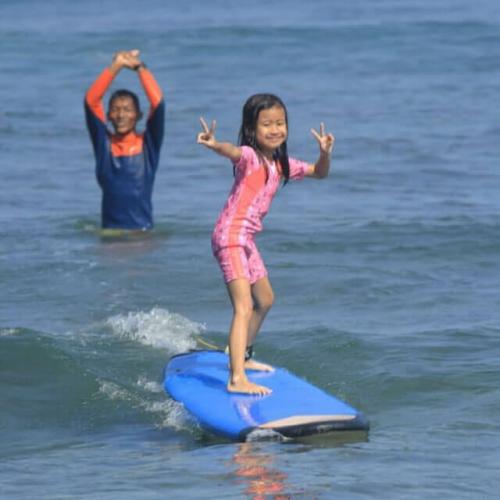 child surfing. Ig @wediombosurflesson